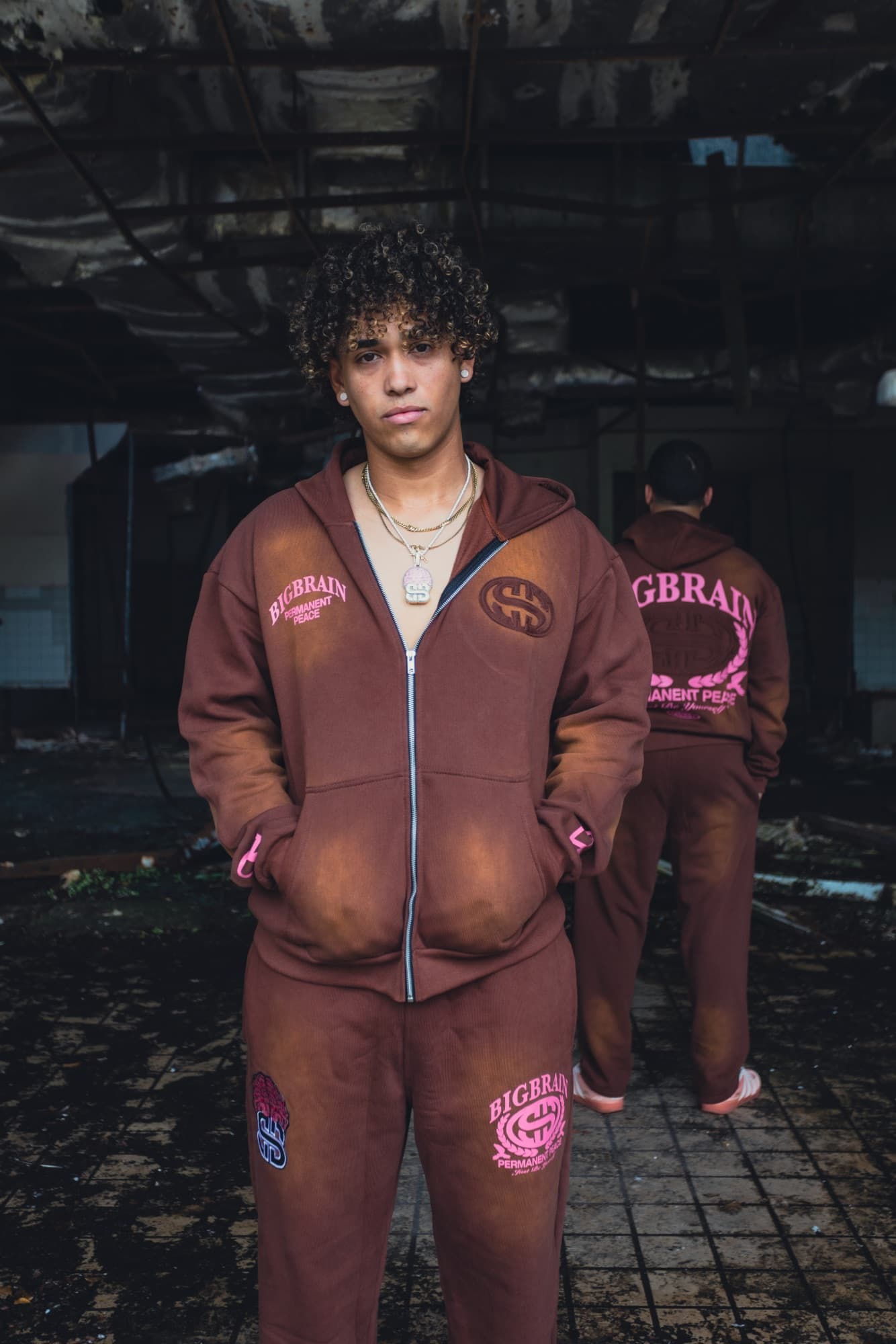 Two models inside an abandoned building