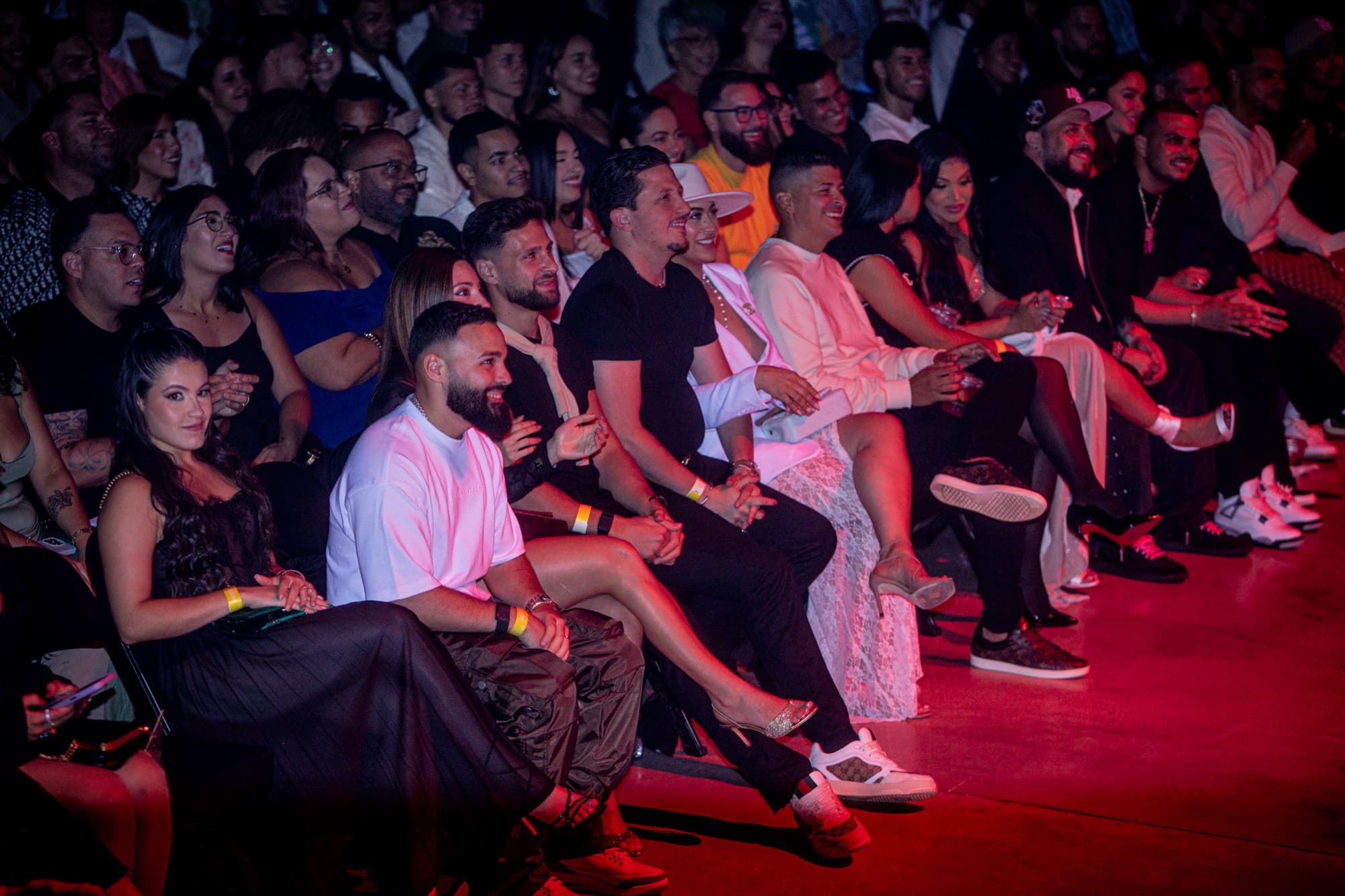 The front row dressed up and laughing