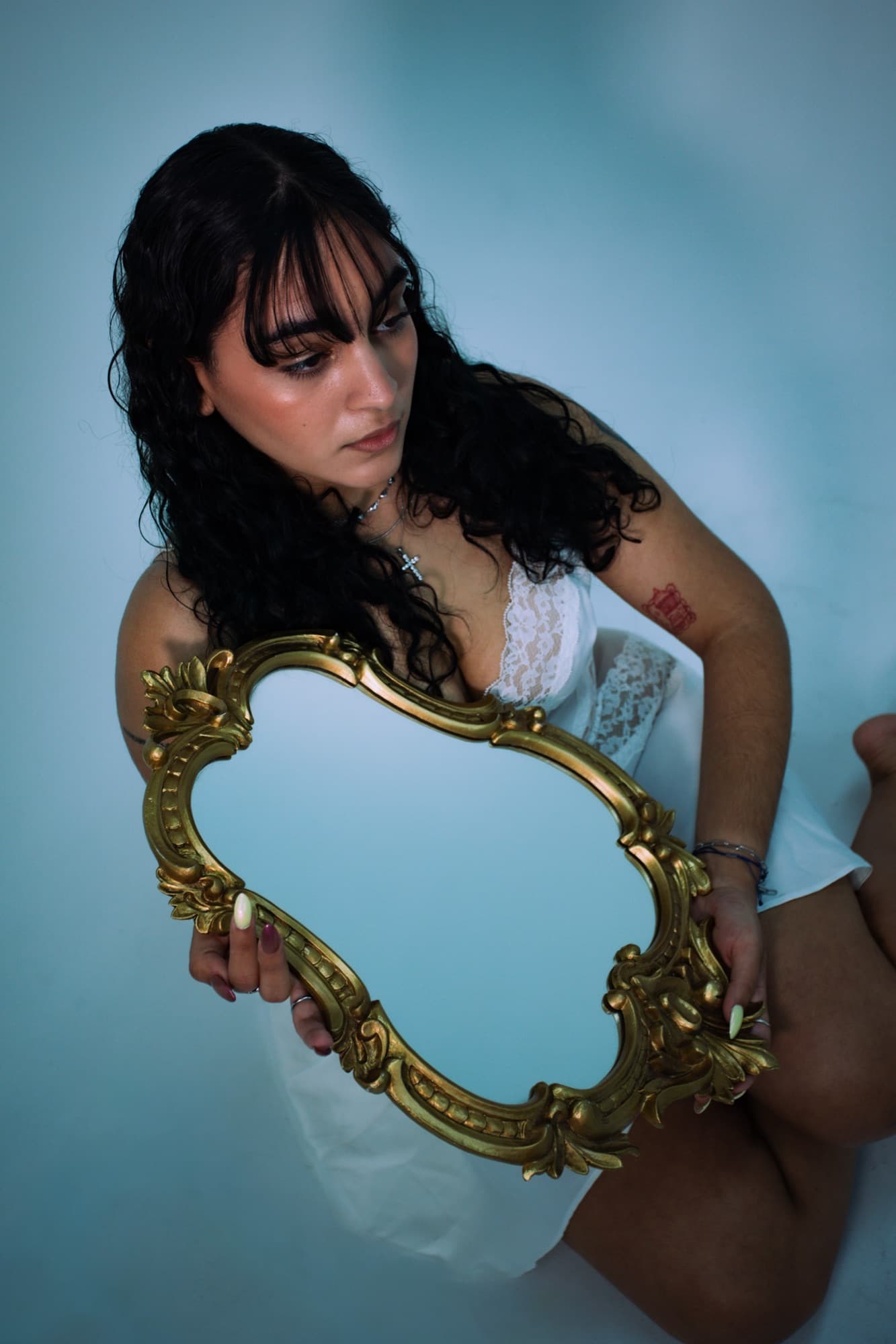 Reclined pose reflected in the mirror