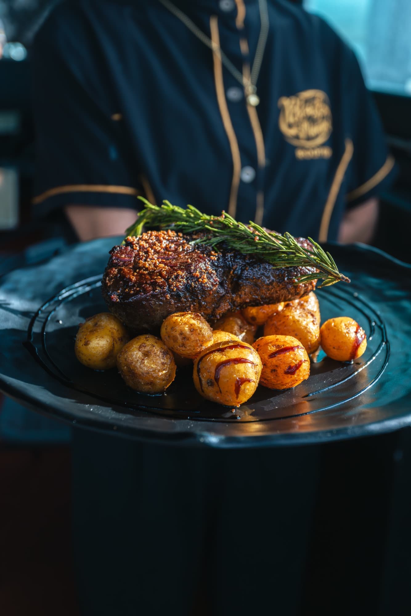 Seared steak plated in warm light