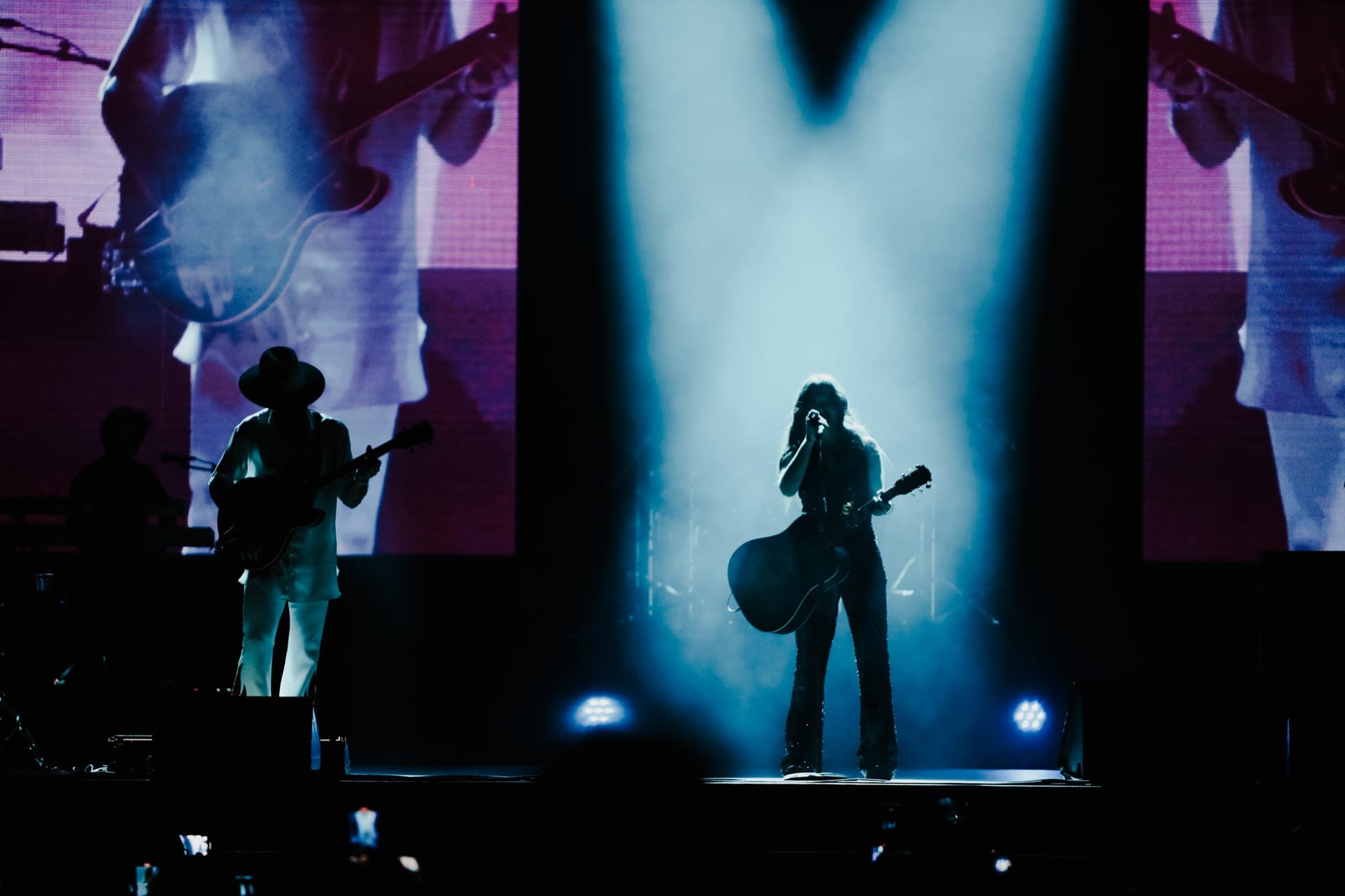 Light rays cutting across the stage haze